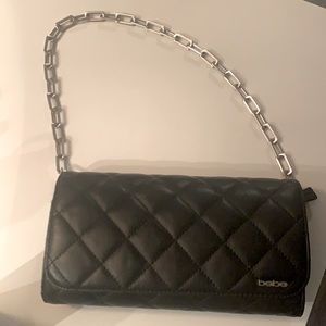 Bebe black fake leather clutch